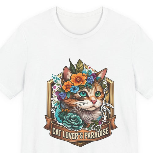 Close-up of the Cat Lover's Paradise print: calico cat in a flower crown inside a bronze Cat Lover's Paradise badge, on the White tee